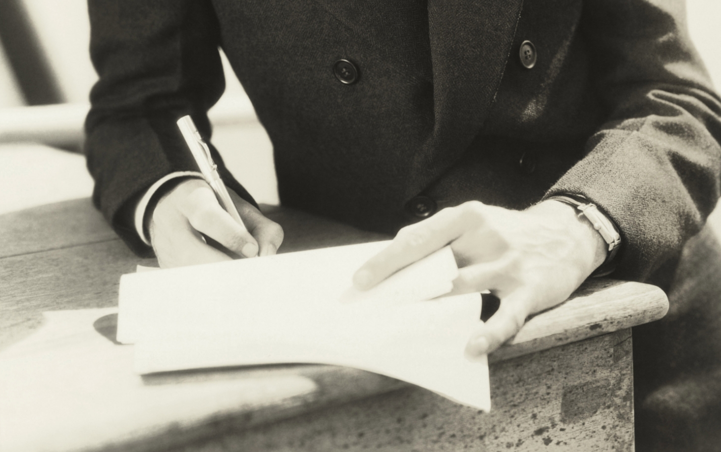 Man signing a contract